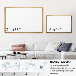 May include: Two framed canvases with dimensions of 24"x36" and 16"x24" are displayed. The image also shows the steps for hanging the artwork, including the art hanging toolkit, screw hook, hammer, and attaching the art to the hanger. Text reads "Hooks Provided".