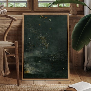 May include: Abstract art print in a wooden frame. The artwork features a dark green and gold color palette with a textured appearance. The painting has a moody, atmospheric quality, with hints of light and shadow.