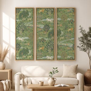 May include: Three framed wall art panels with a green tapestry design. The tapestry depicts a pastoral scene with trees, animals, and a river. The frames are a light brown color, and the overall aesthetic is vintage.