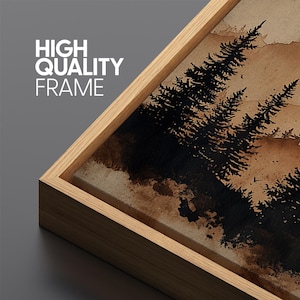 May include: A framed canvas art print featuring a sepia-toned landscape with silhouetted pine trees. The artwork is encased in a natural wood frame. The text "HIGH QUALITY FRAME" is visible in the upper left corner.