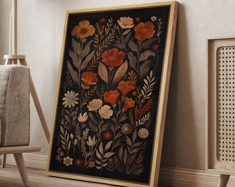 May include: A framed print of a botanical illustration featuring a variety of flowers and leaves in shades of orange, red, and brown on a black background.