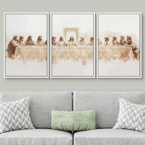 May include: A triptych painting depicting a scene of Jesus and his disciples at the Last Supper. The painting is done in a watercolor style with muted brown and beige tones. The painting is framed in a white frame.
