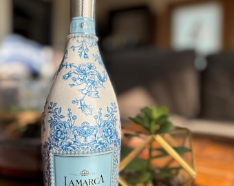 Beautifully decorated Blue and White Champ Bottle!