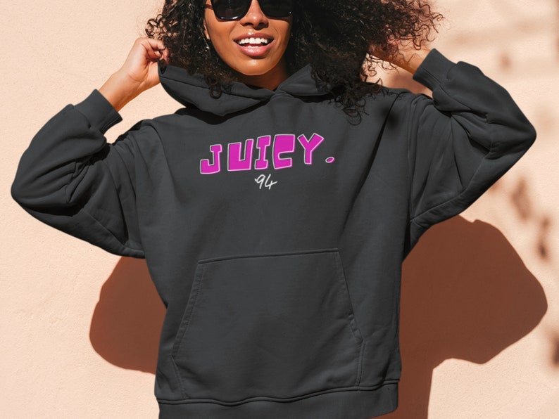 May include: Black hoodie with a pink "JUICY. 94" graphic on the front.