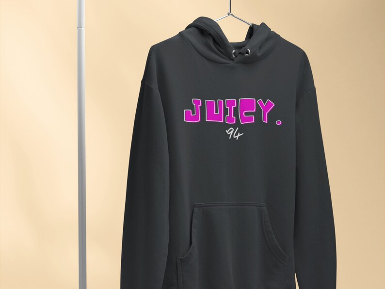 May include: Black hoodie with a pink "JUICY. 94" graphic on the front.