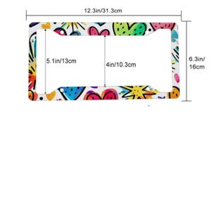 May include: A rectangular license plate frame featuring a colorful pattern of hearts, stars, and abstract shapes. The frame measures 12.3 inches by 6.3 inches, with an inner opening of 4 inches by 5.1 inches, as indicated by the visible dimension lines.