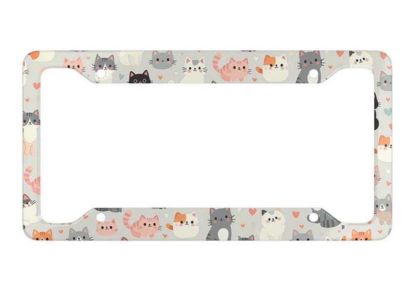 May include: A car number plate frame featuring a repeating pattern of cartoon cats in various colours on a light grey background. The cats have different expressions and small pink hearts.