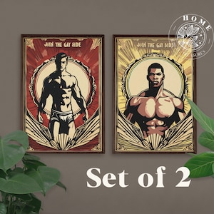 May include: Set of two framed prints with a vintage aesthetic. Each print features a muscular man with a bold, graphic design. The text on each print reads "Join the Gay Side".