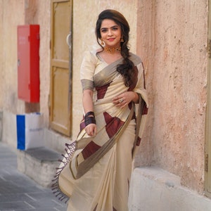 Big temple golden tissue color kara saree with blouse design
