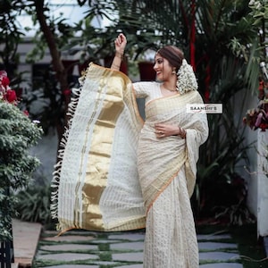 Pure handloom tissue jari line Kasavu Kerala saree