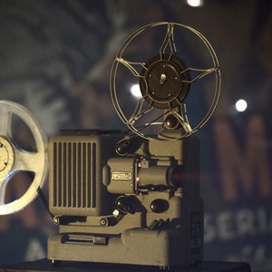 Logo animation 20th century projector projects your own logo in old style cinema interior. Upload your own logo and background, get unique intro