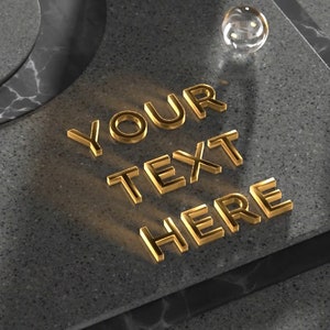 May include: A gold 3D text overlay on a gray marble surface with the words "YOUR TEXT HERE".
