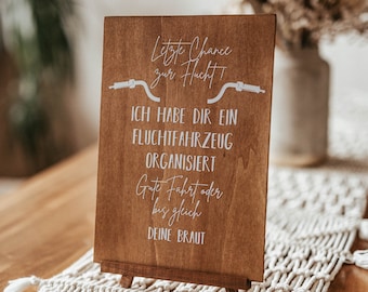 Holzschild, Fluchtfahrzeug, Hochzeit, letzte Chance