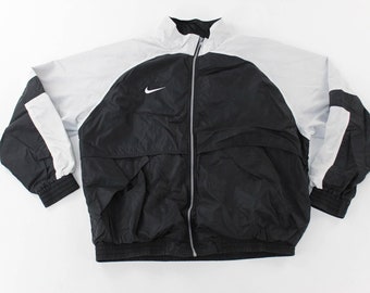 black nike zip up jacket