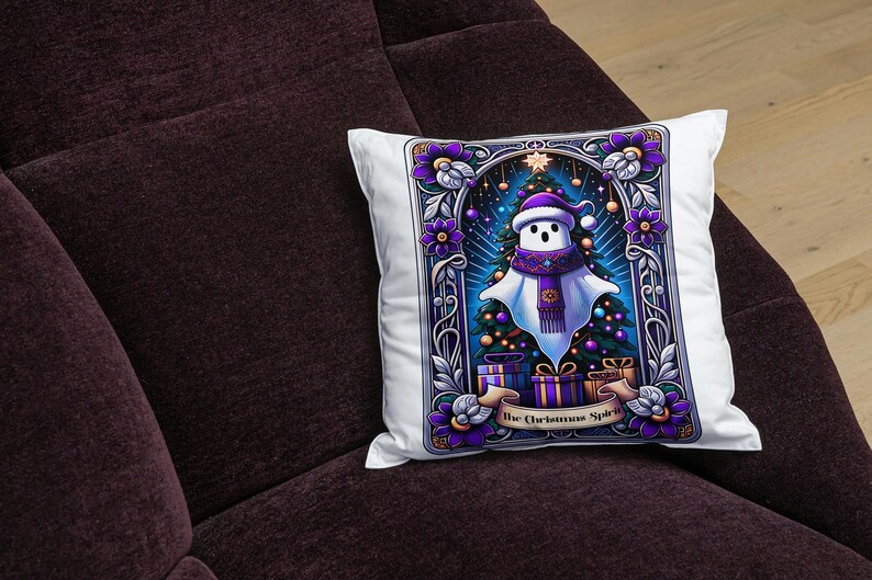 May include: A white throw pillow with a colorful illustration of a ghost wearing a purple scarf and a Santa hat. The ghost is standing in front of a Christmas tree with presents underneath. The text "The Christmas Spirit" is at the bottom of the illustration.
