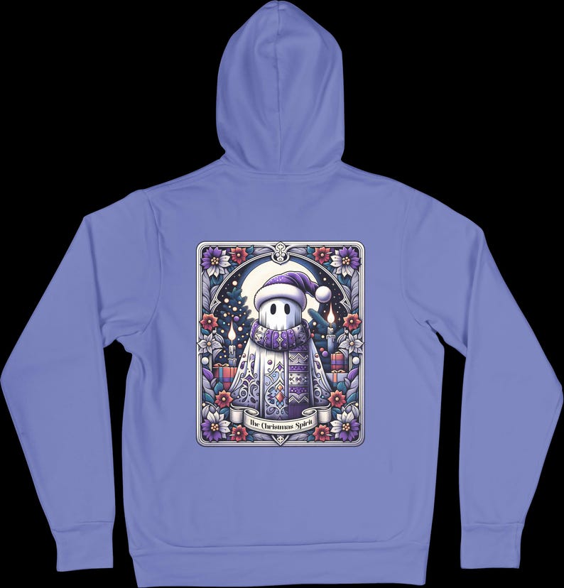 May include: A light blue hoodie with a graphic of a ghost wearing a Santa hat and holding a gift. The graphic is surrounded by a floral border and the text "The Christmas Spirit".