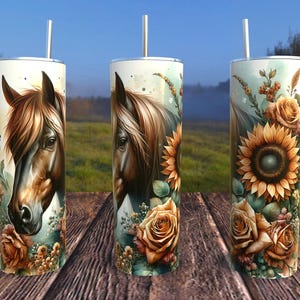 May include: Three stainless steel tumblers with different designs. The first tumbler features a brown horse with a white mane and a floral design. The second tumbler features a brown horse with a white mane and a sunflower design. The third tumbler features a sunflower and rose design.