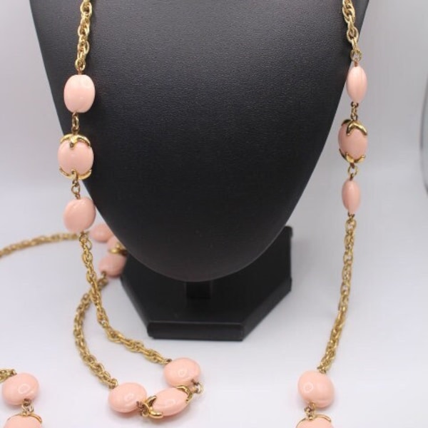 Crown Trifari Signed Vintage Long Gold Tone Necklace with Pink Lucite Beads.
