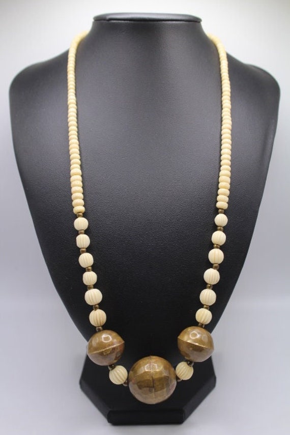 vintage horn and metal Gem