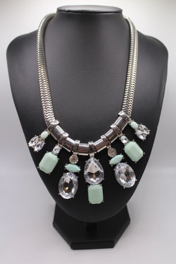 Express Silver Tone Bib Necklace with Teal Faux Ge