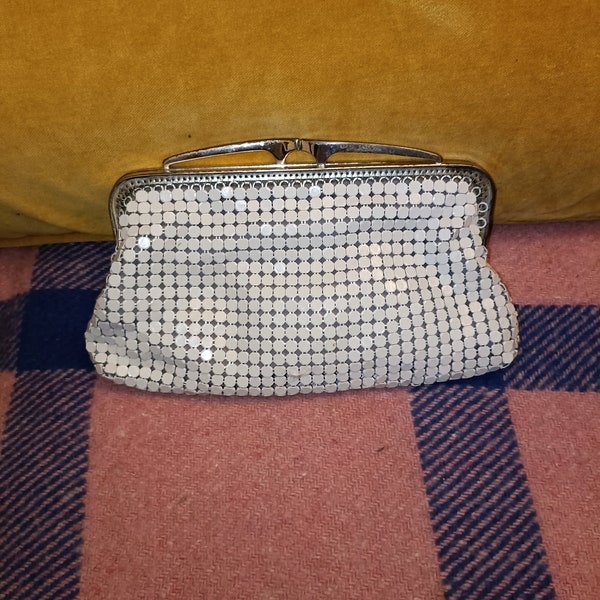 Vintage Australian white Glomesh hand purse with a green grey color lining and silver top clap.