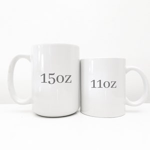 May include: Two white ceramic mugs, one is 15oz and the other is 11oz.