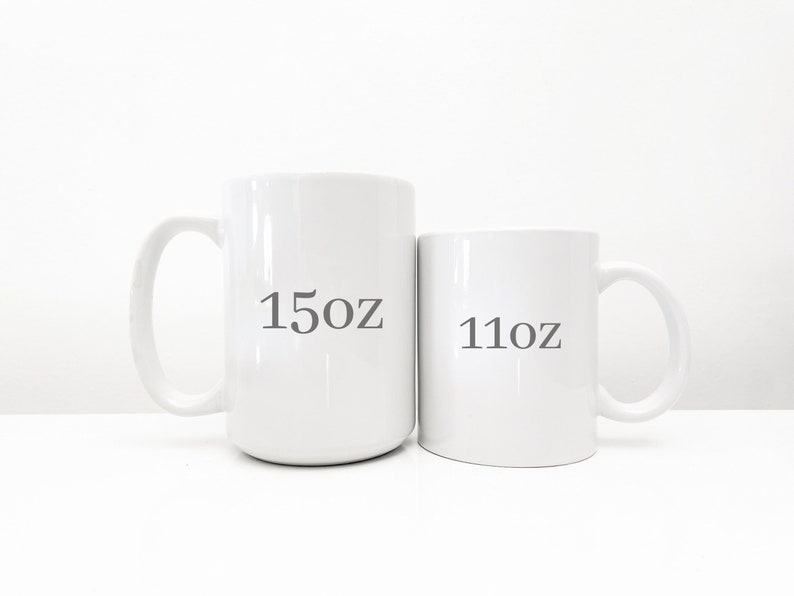 May include: Two white ceramic mugs, one is 15oz and the other is 11oz.