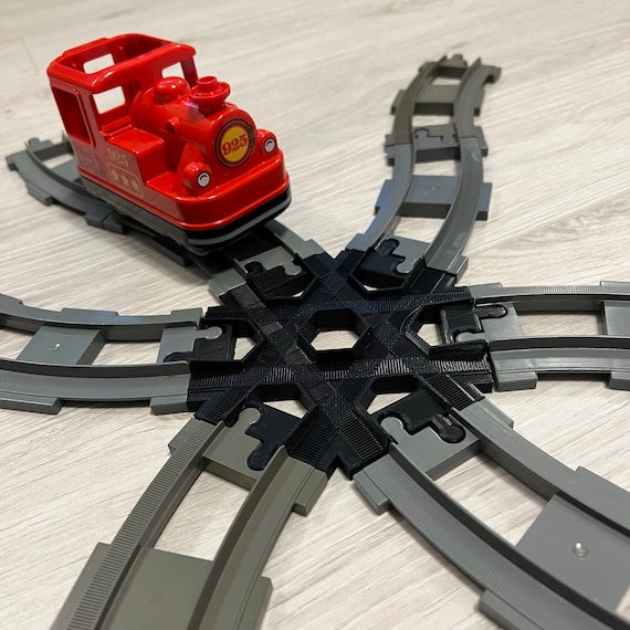 Duplo train crossing new arrivals