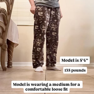 Fluffy Dinosaur Skeleton Pajama Pants | Cozy Lounge Pants with Pockets afbeelding 3
