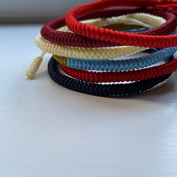 Handmade adjustable knot rope friendship bracelet braided Buddhist Tibetan for men, women and children