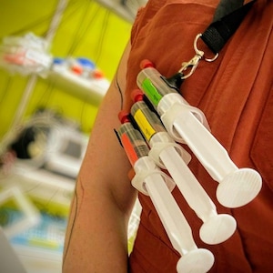 Syringe holder - carbon/glass fiber nylon FDM printed