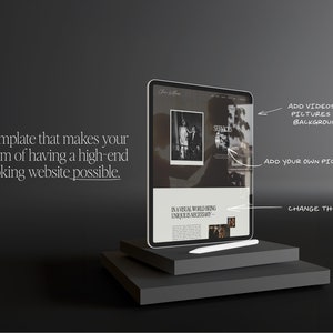 May include: A mockup of a website template on a tablet, showcasing a dark background with a black and white photo of a couple. The text "In a visual world being unique is necessary" is visible on the screen. The text "Services" is also visible on the screen. The tablet is on a black platform.