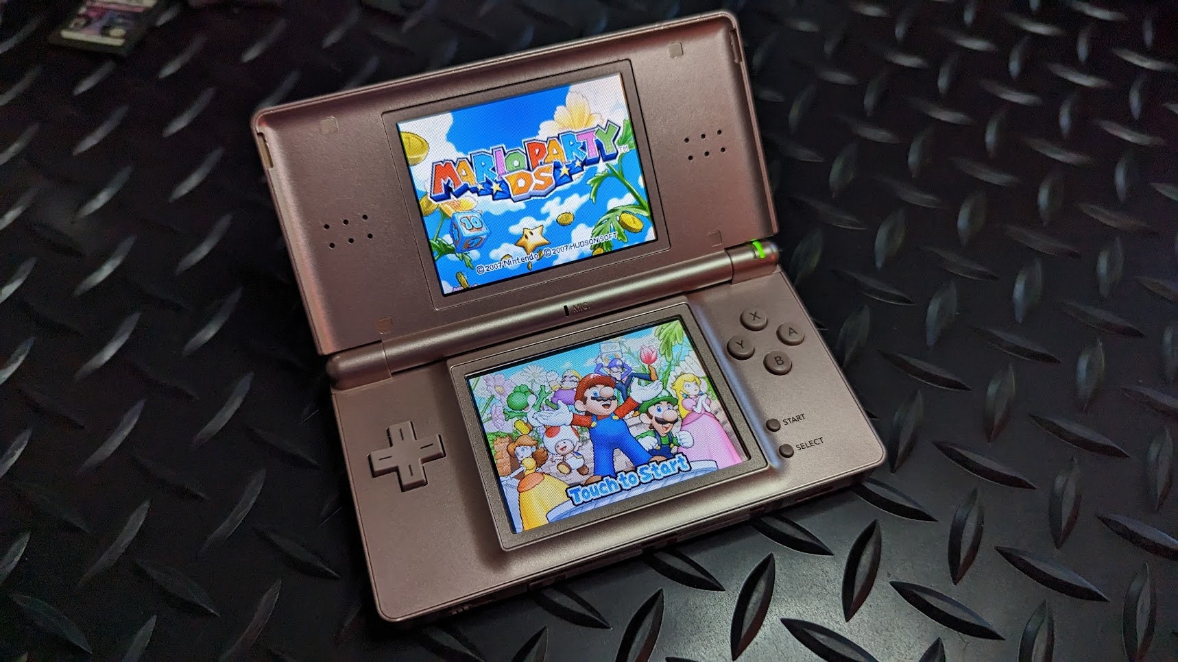 Nintendo DSi XL Metallic Rose feat. Kirby Super Star Ultra in 2023