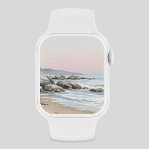 Könnte beinhalten: Eine weiße Apple Watch mit einem digitalen Zifferblatt, das ein Aquarellbild einer Strandszene mit Felsen und Wellen zeigt. Der Himmel ist in sanftem Rosa und Blau gehalten.