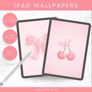 May include: Two iPad screen mockups with pink backgrounds. The left screen shows a pink satin bow with a pearl heart in the center. The right screen shows two pink cherries with a pink satin bow on the stem. The text "Coquette Style" is at the bottom of the image.