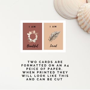 May include: Two printable affirmation cards with a brown and beige background. The first card features a hexagon shape made of dried flowers and the text "I AM Beautiful". The second card features a brown feather and the text "I AM Loved".