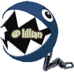 Może przedstawiać: Niebieska postać w pikselach z szeroko otwartą paszczą i łańcuchem. Gęba postaci ma białe zęby i czarne wnętrze. Wewnątrz paszczy widnieje tekst '@lillian'.