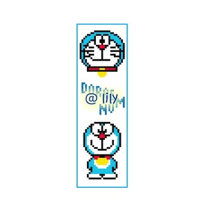 May include: A blue and white pixelated bookmark featuring a cartoon character with a red nose and yellow collar. The text "Dorae @lily mum" is printed on the bookmark.