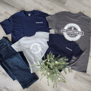 The Lucky Few Co. Down Syndrome Awareness T21 Unisex T-Shirts