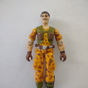 GI Joe ARAH 1986 Clyamore Special Mission Brazil (v1). Gebroken kruis. Lees de beschrijving en zie foto's voor de staat.