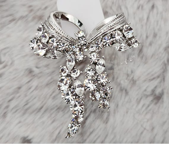 New Sparkling Silver Rhinestone Bow Brooch Sparkling Bow Brooch with Crystal Detail | Anne Klein main image 3