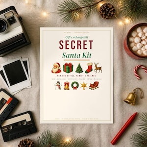 May include: A Secret Santa Kit gift exchange kit printed on a rectangular card with festive icons including Santa, gifts, a tree, a stocking, a reindeer, a snowman, a bell, a wreath, a star, and a sleigh, surrounded by holiday items.