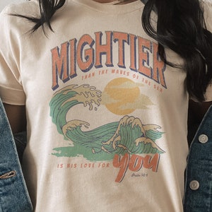 Mightier than the waves , christian tshirt, retro smile face, smiley, Christian jesus loves you , retro daisy tshirt,  sand colored T-shirt