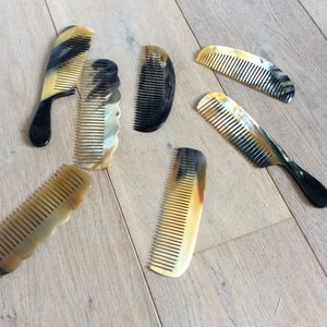 Polished zebu horn comb