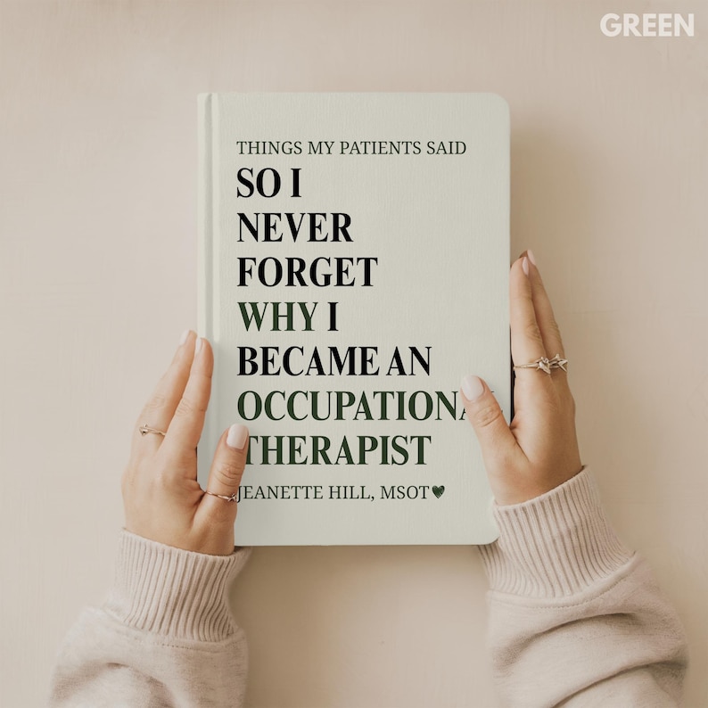 May include: A pale green notebook with the text "THINGS MY PATIENTS SAID" and "SO I NEVER FORGET WHY I BECAME AN OCCUPATION THERAPIST." The notebook is held by two hands with rings. The word "GREEN" is in the top right corner.