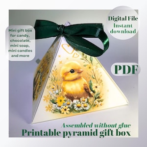 May include: Printable PDF template for a pyramid-shaped gift box. The box features a yellow chick surrounded by white and yellow flowers. The text "Assembled without glue" and "Printable pyramid gift box" is included on the image.