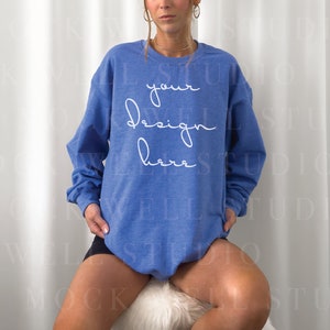 Gildan 18000 Mockup Heather Sport Royal | Blue sweatshirt Mockup, Model Mockup, blue sweater mockup, mockup, gildan 18000, oversized mockup