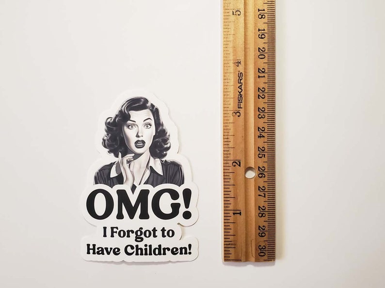 May include: A white sticker with a black and white illustration of a woman with a surprised expression. The text on the sticker reads "OMG! I Forgot to Have Children!"