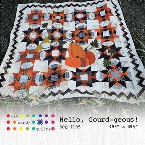 May include: A fall-themed quilt with a pumpkin design and star patterns in orange, black, and white. The quilt measures 49.5 inches by 49.5 inches and features the text "Hello, Gourd-geous!".