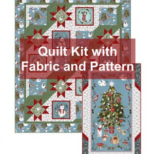 May include: A quilt kit with fabric and pattern. The quilt features a festive design with snowmen, Christmas trees, and a central star pattern in red and green. The text "Quilt Kit with Fabric and Pattern" is overlaid on the image.
